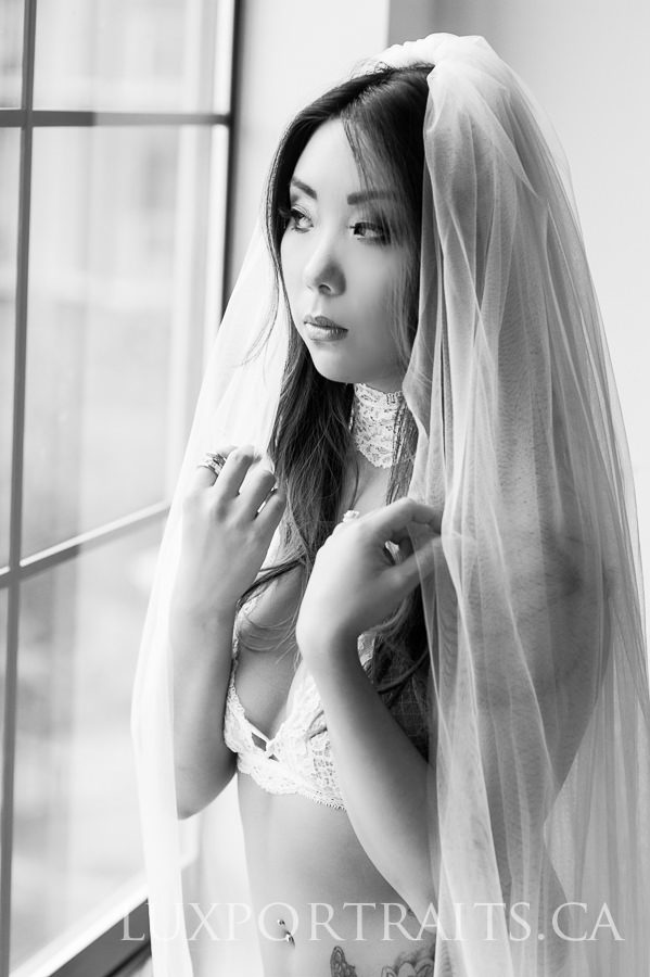bride looking out window 