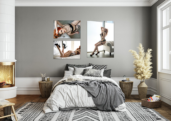 bedroom with boudoir artwork on walls